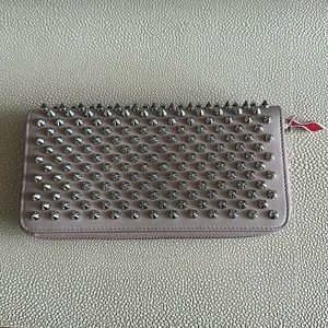Spiked beige Louboutin wallet